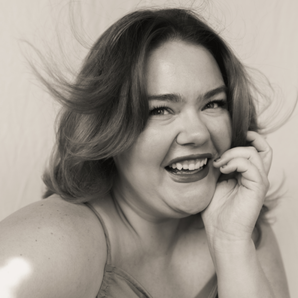 Grayscale side profile of Hope Kelham smiling